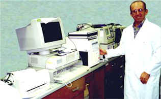 Dr. John Pierce using the HPLC equipment